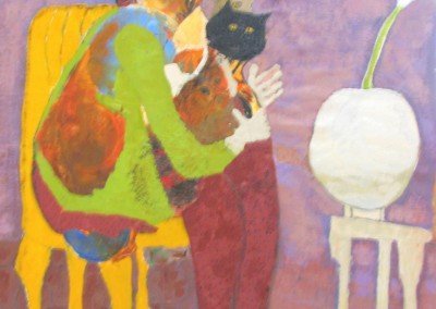 The girl who is hugging her cats